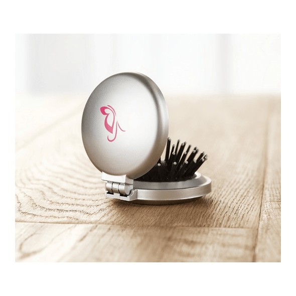 Brosse/miroir pliable